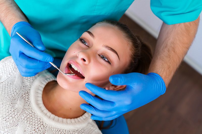 beautiful-girl-consultation-dentist.jpg