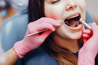 beautiful-girl-sitting-dentist-s-office.jpg
