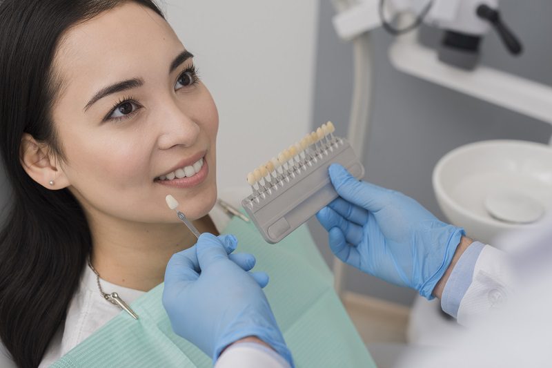 smiling-woman-dentist-1.jpg
